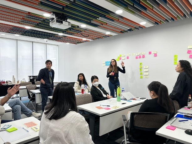 REBORRN's Dafni Prosalika facilitating an in-market workshop in Manila with the PMI Philippines team